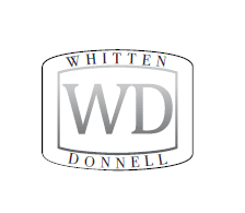 A gold letter w with the letters in the shape of a w.