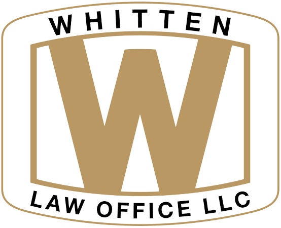 A green and gold logo for whitten law office llc.